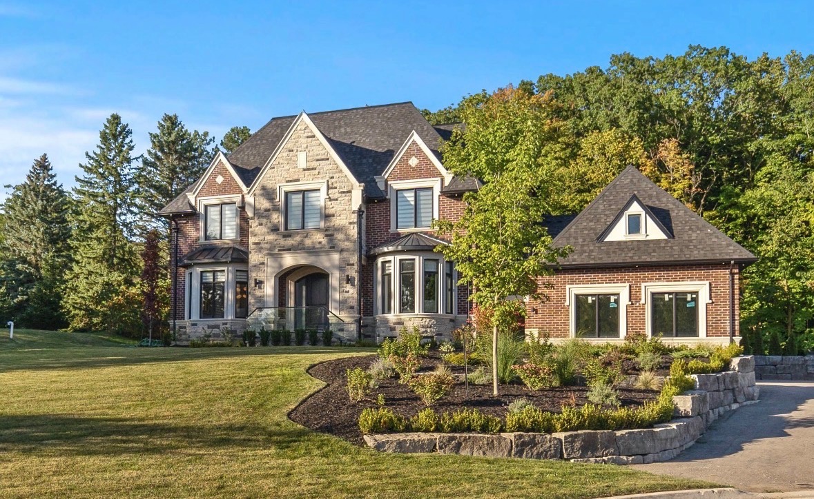 Illustrative landscaped common space with masonry walls